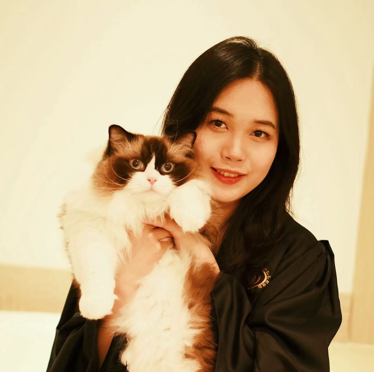 Chichi the cat with Zoe on her college graduation day